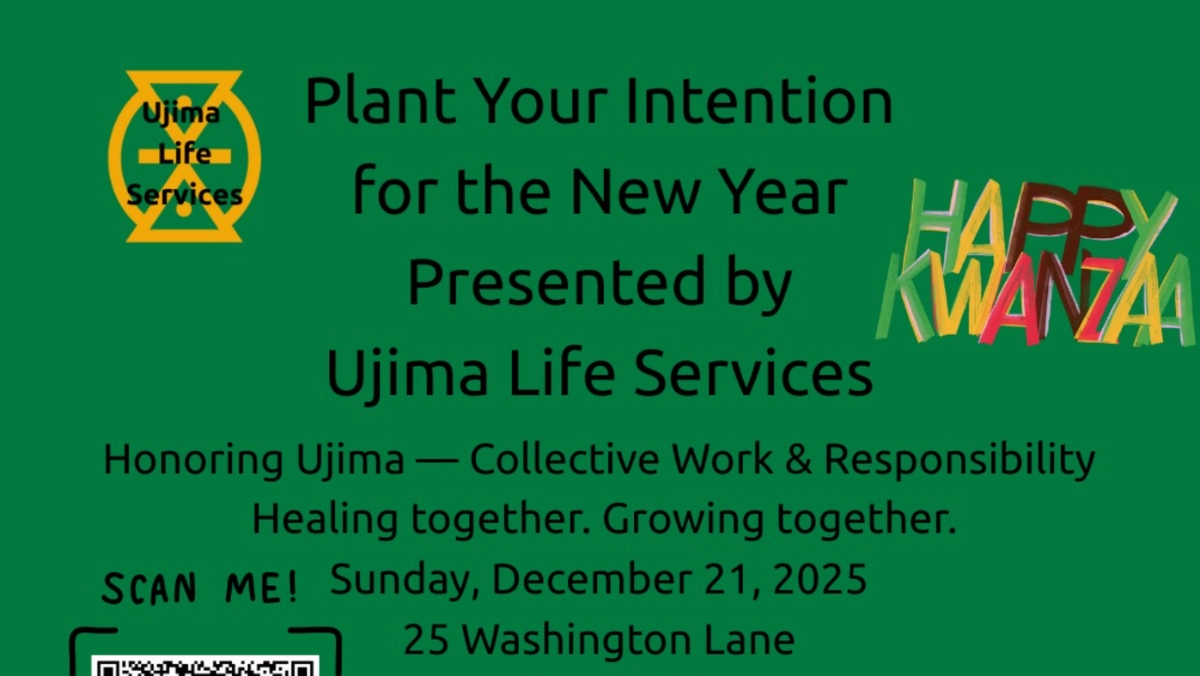 A person writing their intentions in a journal at our New Year intention setting workshop in Cheltenham.