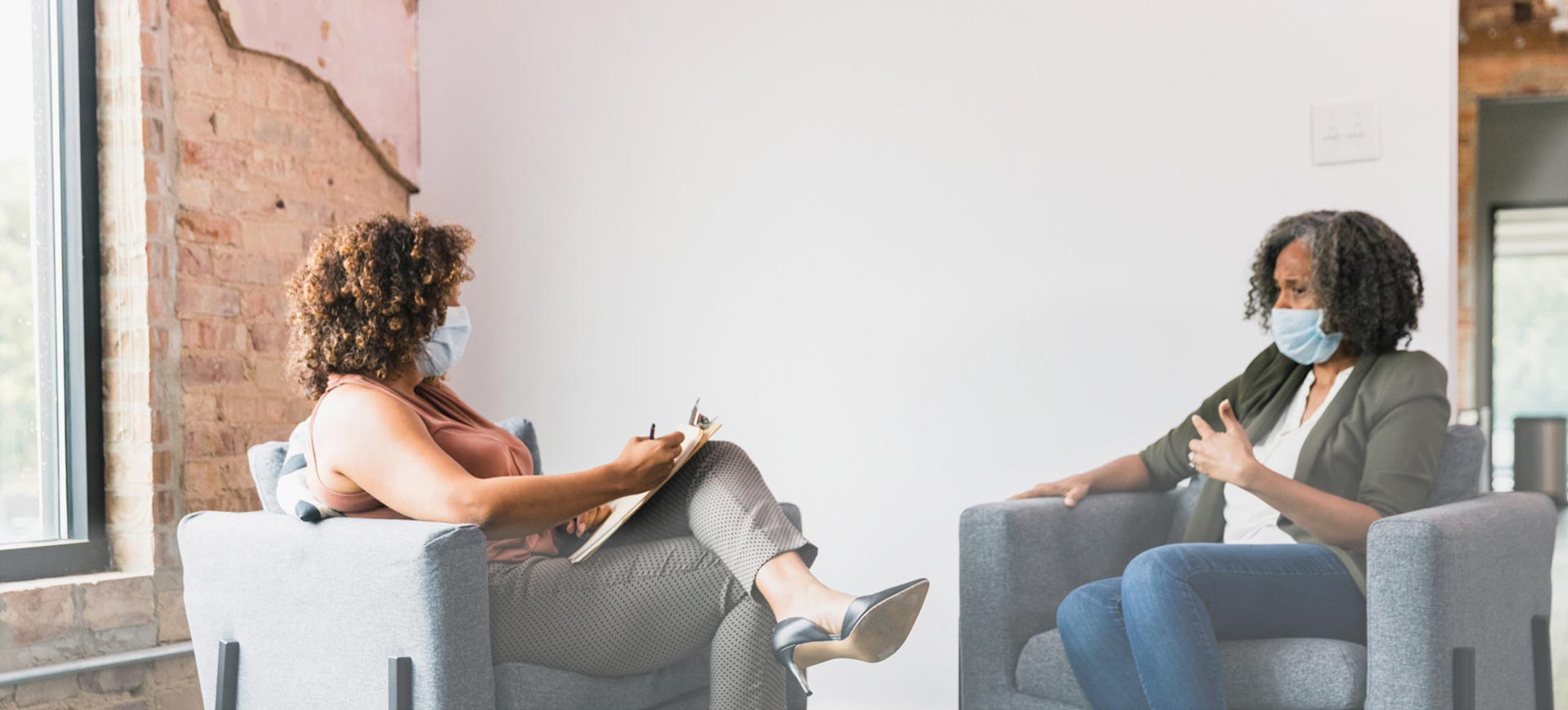 Woman in therapy session with therapist - professional mental health support